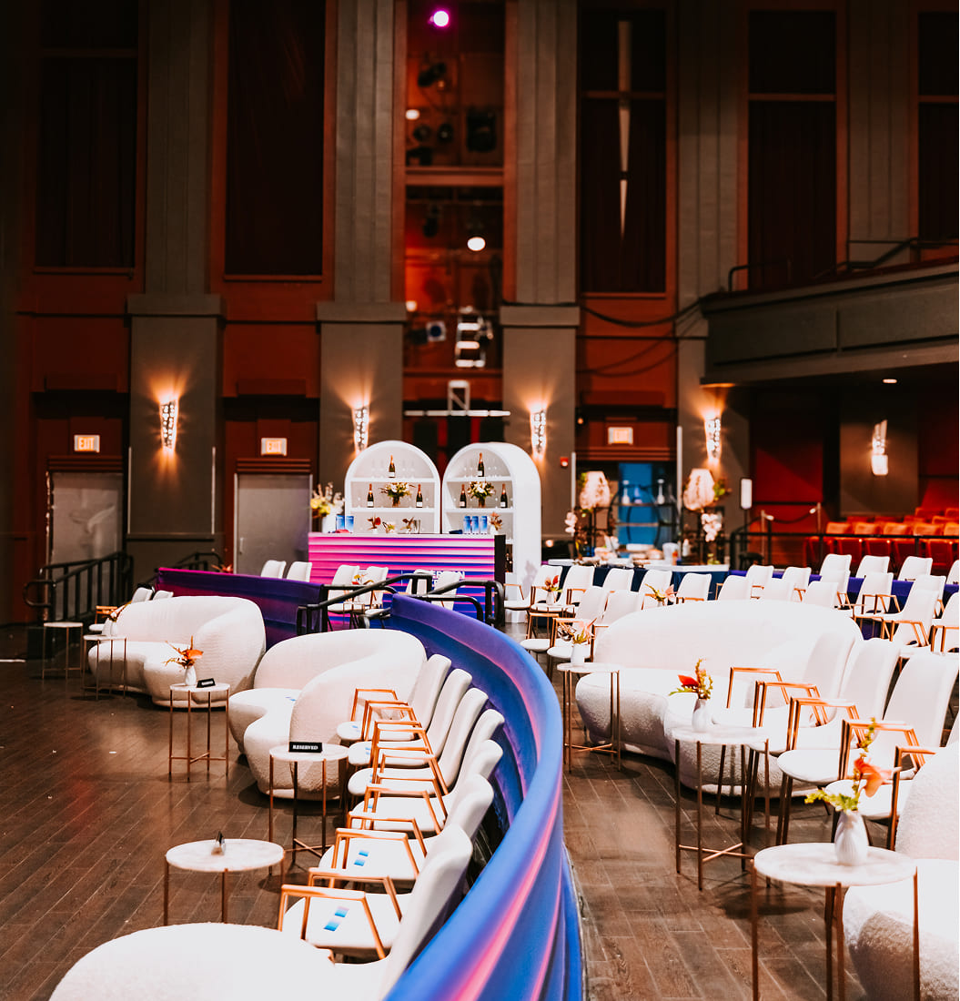 Bride and groom joyfully exit under sparkling lights at Schnebly Redland’s Winery, surrounded by cheering guests holding sparklers