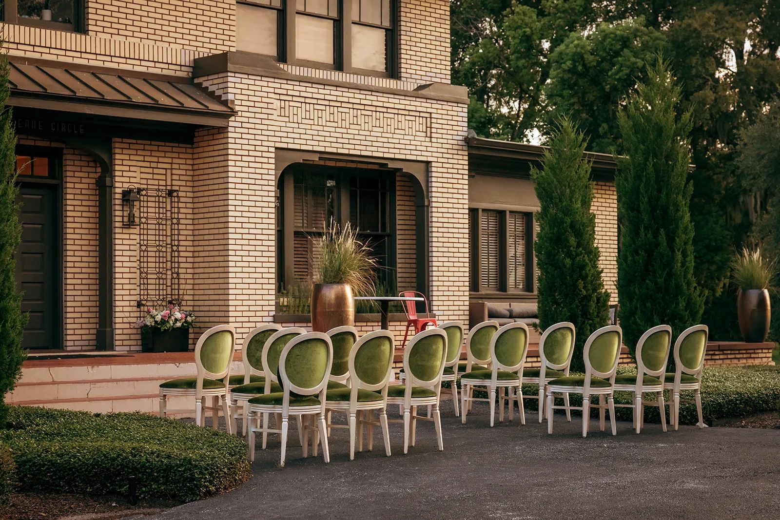 Intimate indoor table setting with candles and florals at The Woodruff